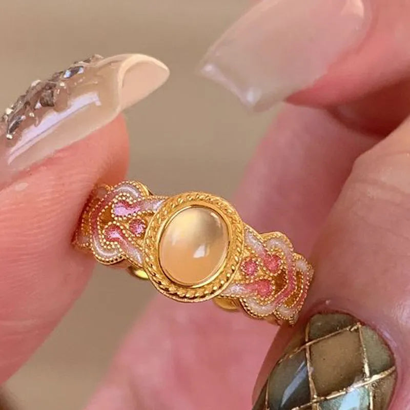 Escape women's open band ring with pink crystal and enamel geometric design
