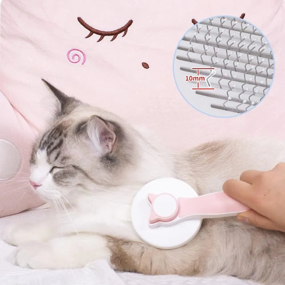 Blue self-cleaning cat brush with rubber-tipped metal pins and a non-slip handle.