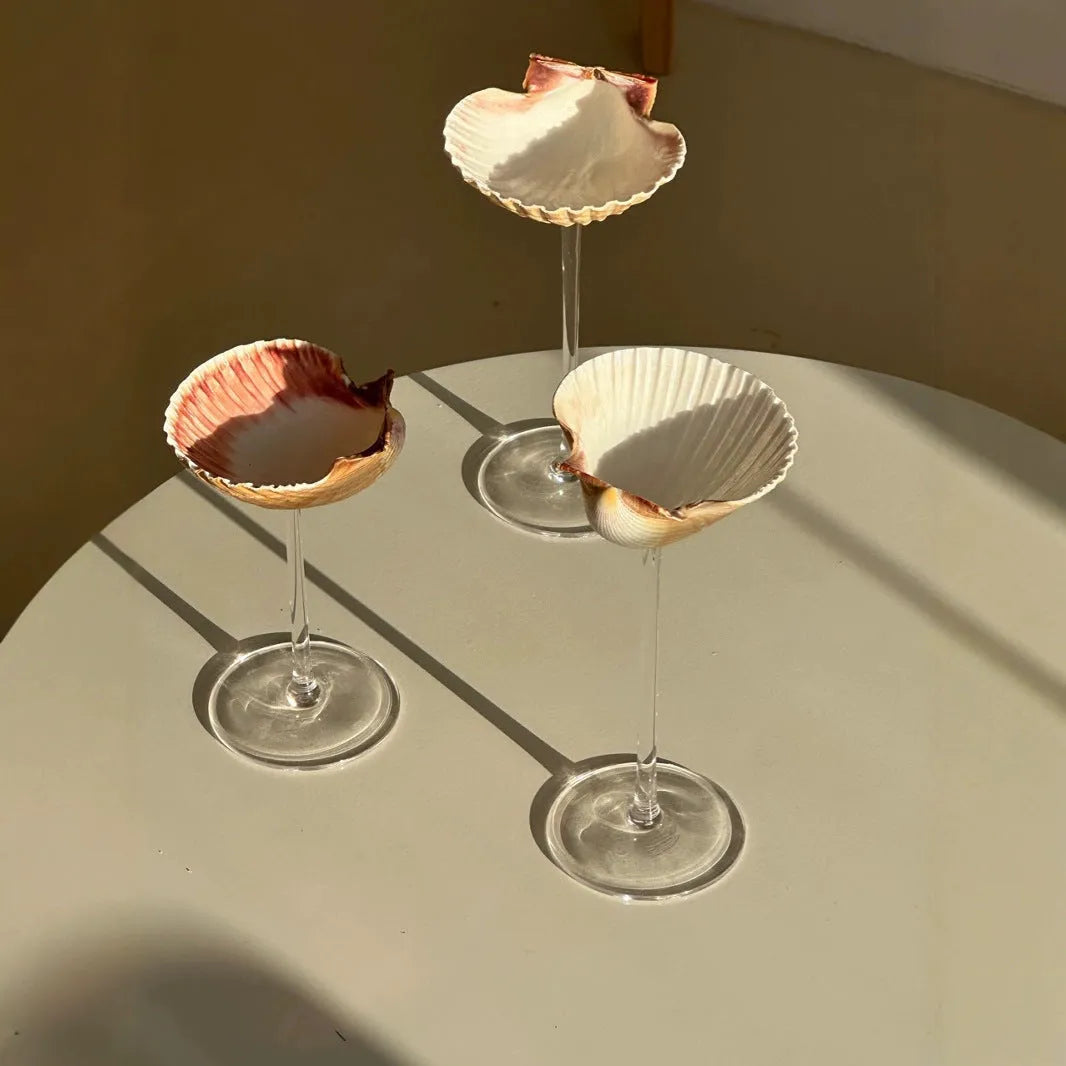 Handmade conch shell glass water cup in clear glass with novelty sea shell design, single cup