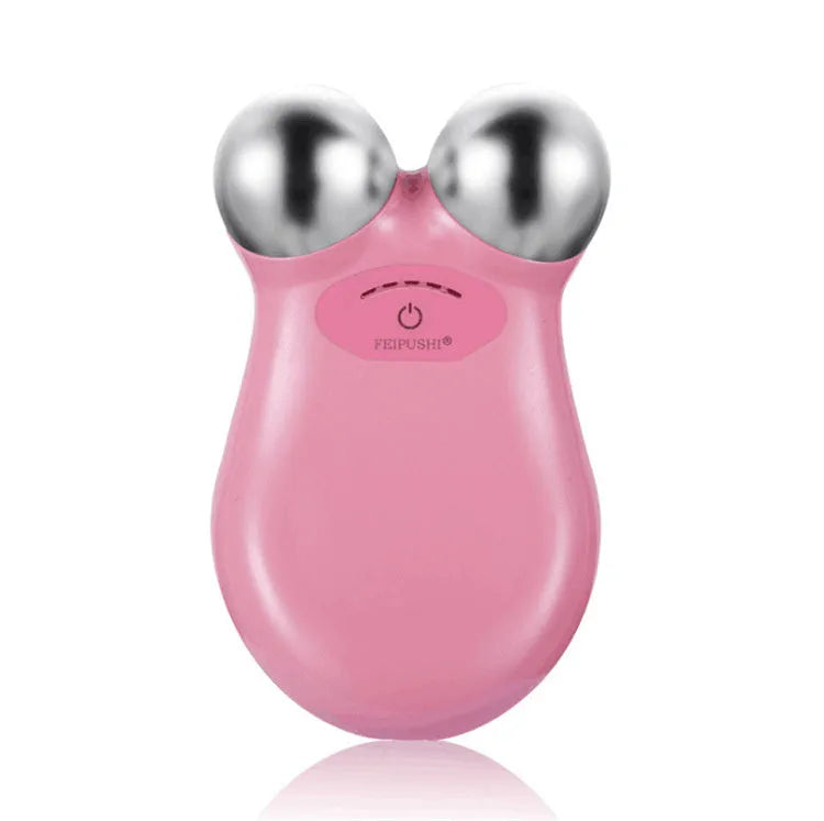 Pink HS-858 micro current facial lifting and firming device with compact design.
