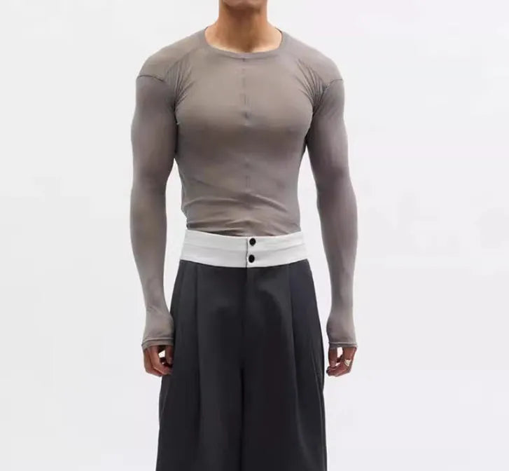 Black slim-fit women's pullover top with mesh see-through texture and long sleeves.