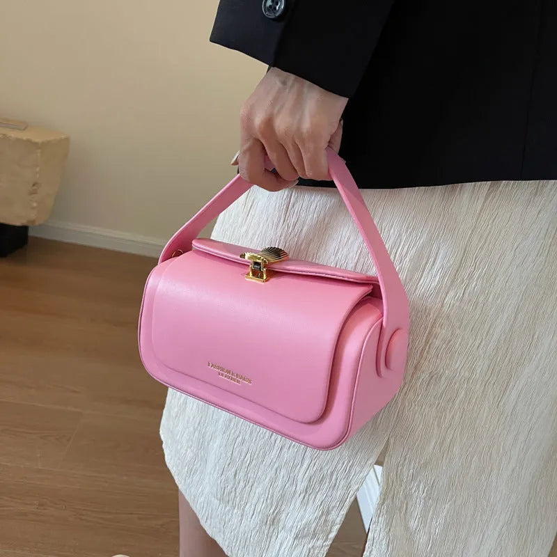 Women's personalised PU shoulder bag with letter stitching in beige, showing messenger-style strap and structured shape