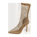 Gold women's high heel sandals with mesh upper, pointed toe, stiletto heel, and rubber sole.