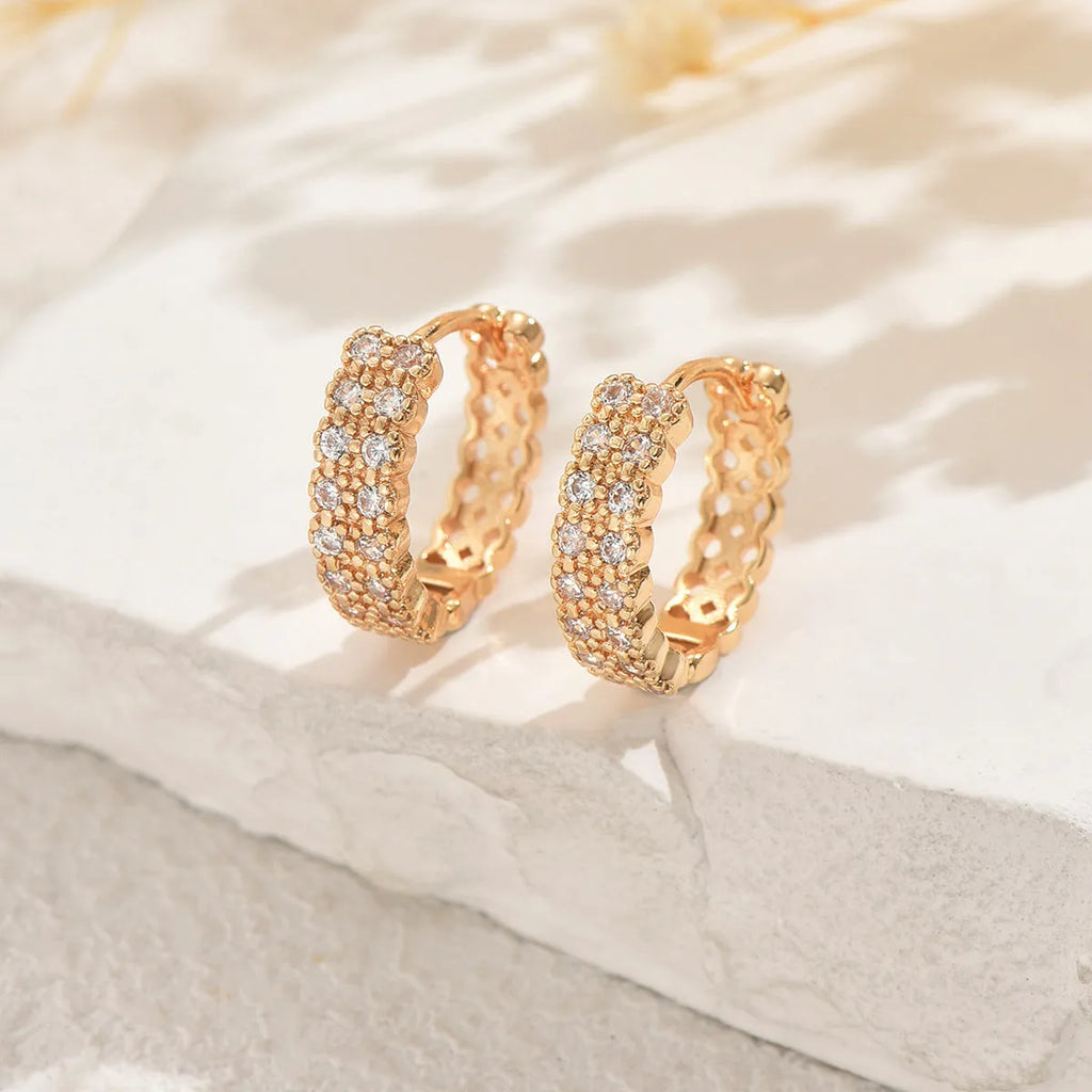 Copper geometry pattern ear studs with circular dot and ring design elements
