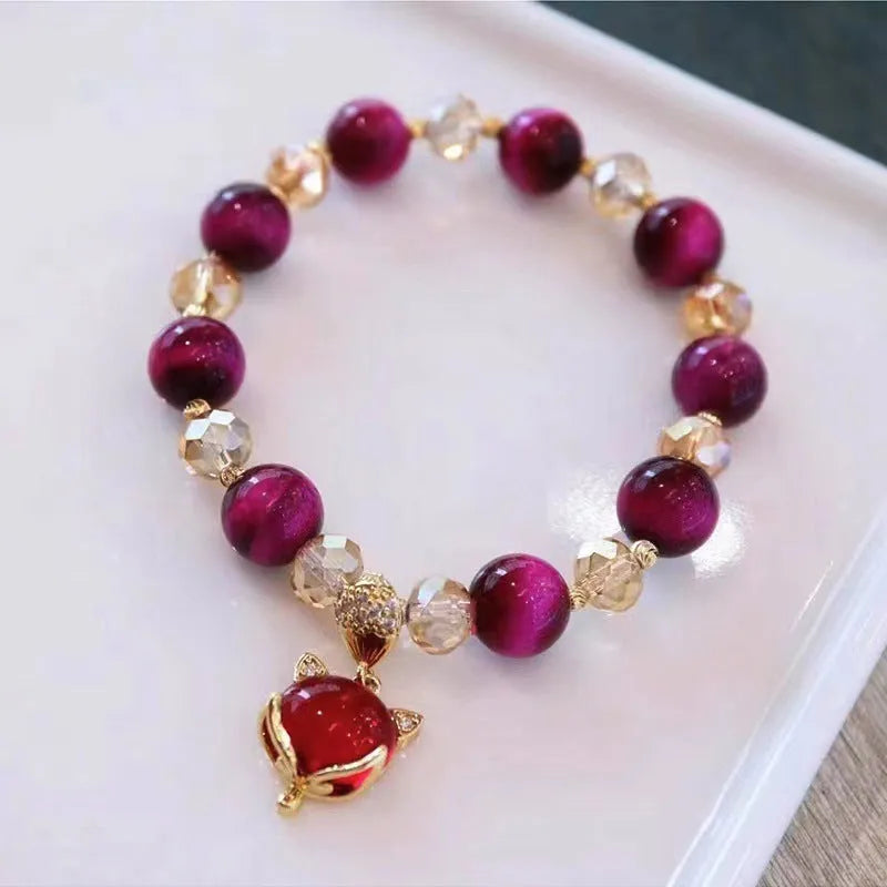 Handmade Tigereye Vanves stone crystal bracelet with leather detailing in rose red or green fox colours