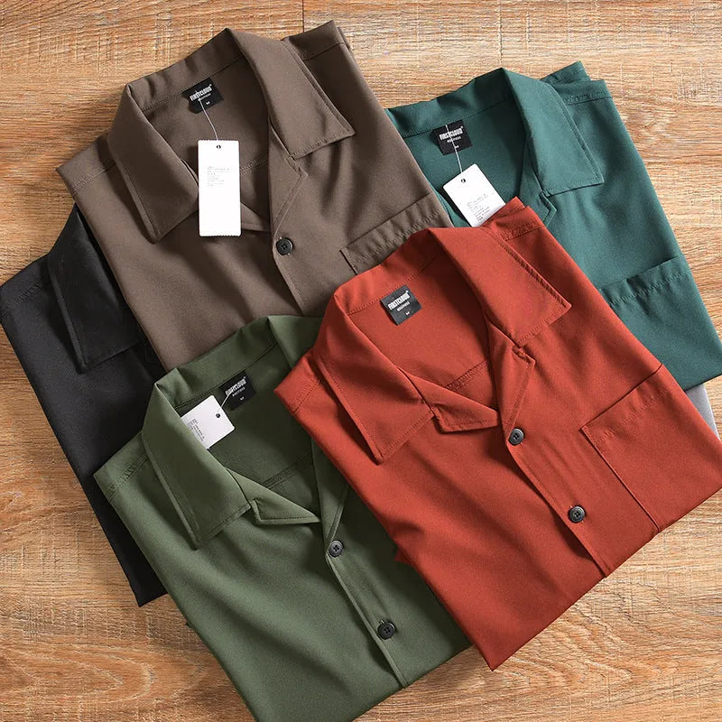Man wearing a loose-fitting, solid colour short sleeve shirt in a Japanese fresh cardigan style.