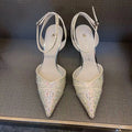 Women's black hollow high heels with stiletto heel, pointed toe, and red sole