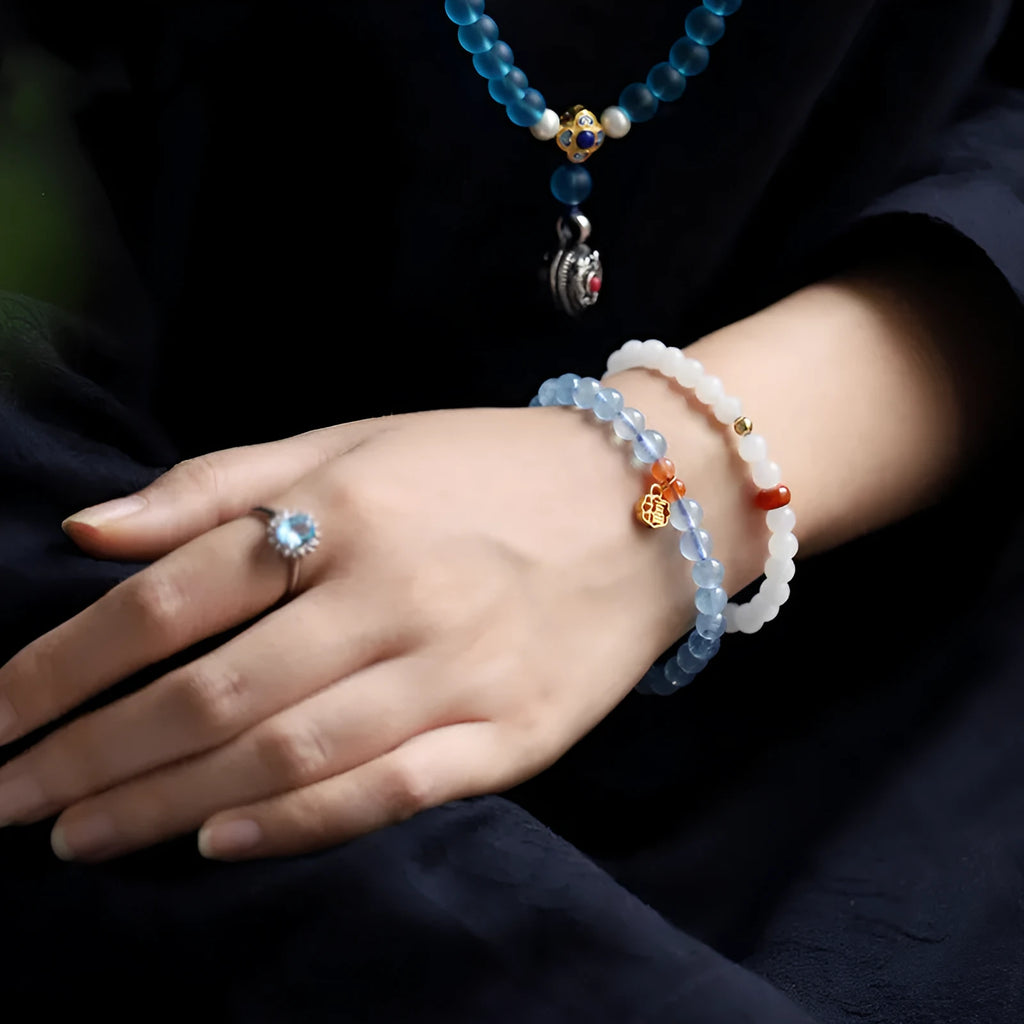 Ice translucent aquamarine crystal bracelet with 8mm round beads and sequin accents