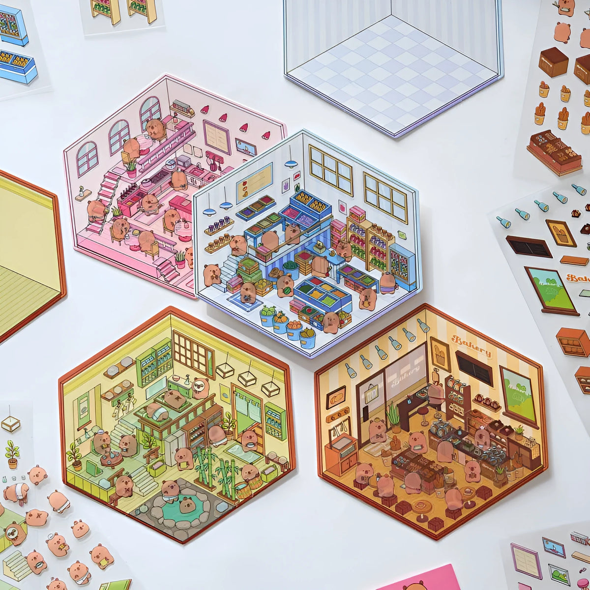 Capabala pre-cut 3D landscaping cartoon stickers on sheet, showing themes like bakery, bookstore, and flower shop.
