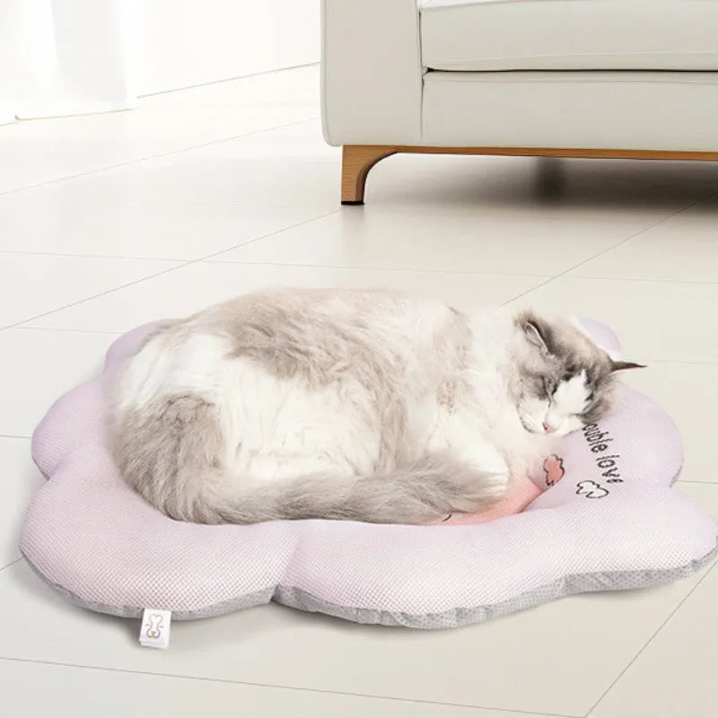 Green or pink pet cooling mat for dogs and cats in four sizes from 56cm to 86cm