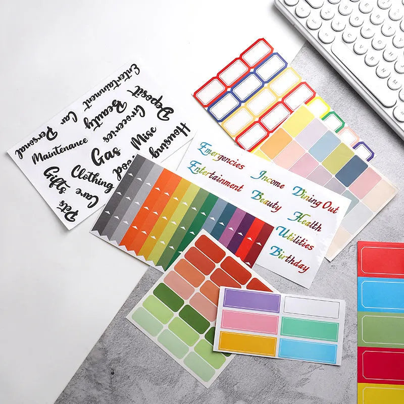 Assorted paper adhesive stickers including grid sheets, colourful sticky notes, and A6 ruler on a surface.