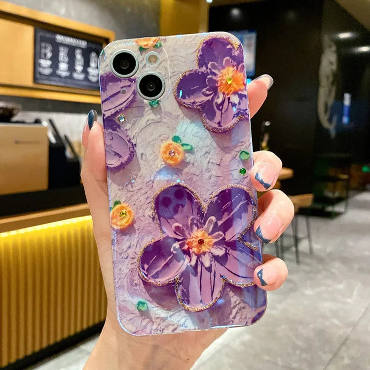 Purple and yellow soft rubber phone cases with ornate oil painting flower design and blue inlays.