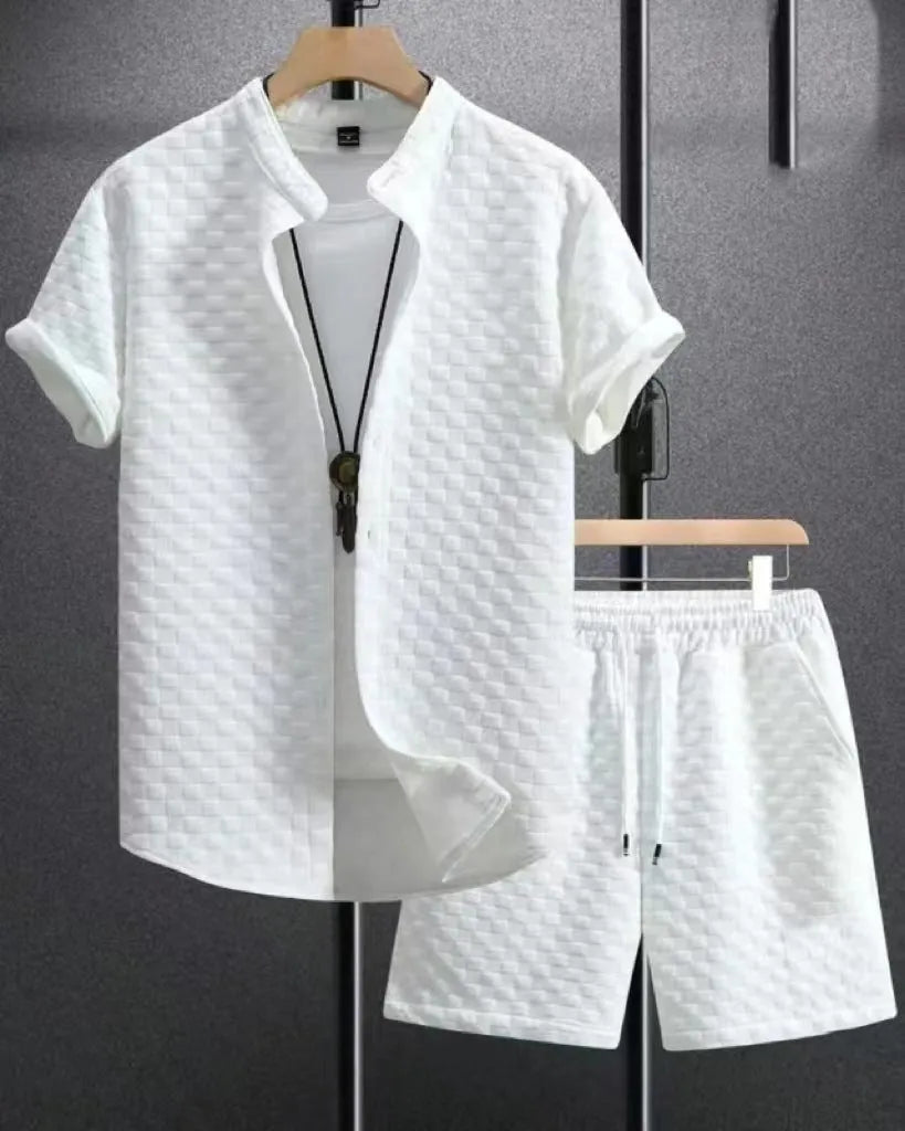 Mens black and white jacquard short sleeve shirt and matching shorts suit set on a hanger.