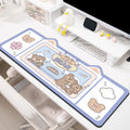 Oversized natural rubber mouse pad on a desk, shown in pink bunny design, with various size options.