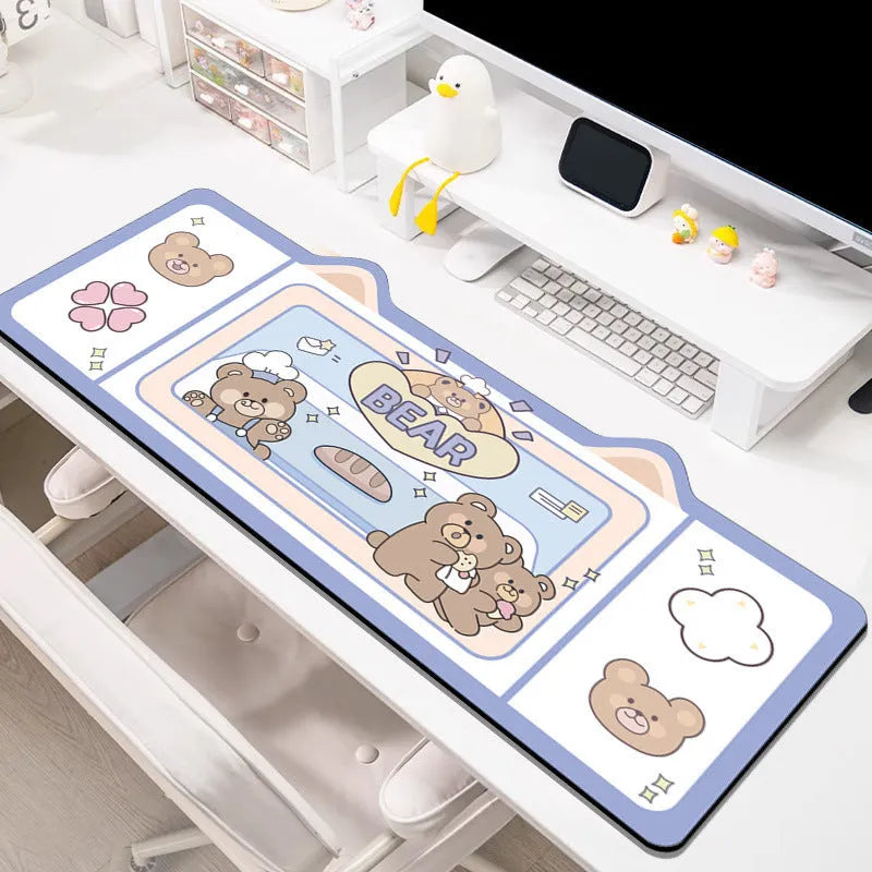 Oversized natural rubber mouse pad on a desk, shown in pink bunny design, with various size options.
