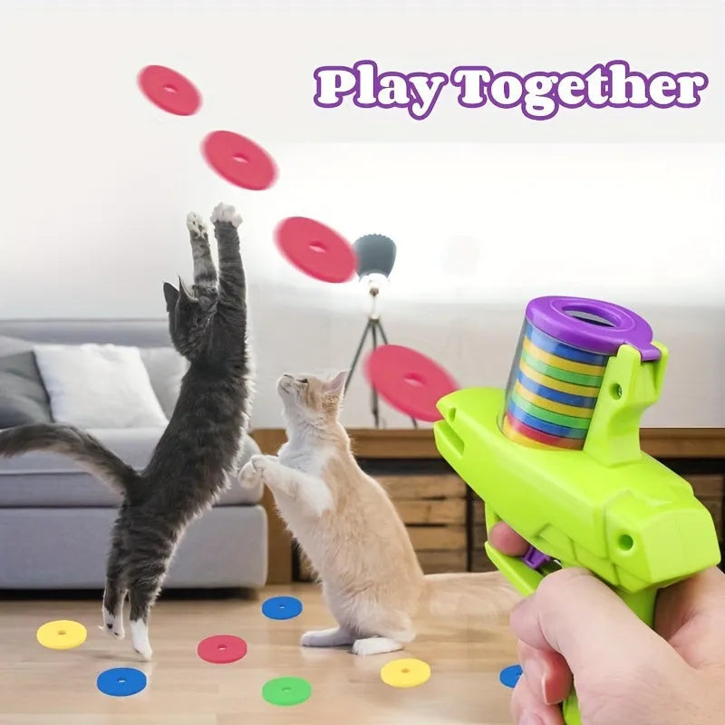 Green and purple battery-free interactive cat toy launcher with foam discs