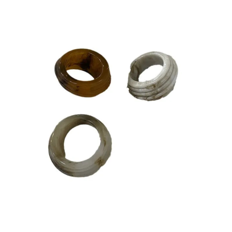 Chinese style geometric resin ring with irregular wide band design in neutral colour