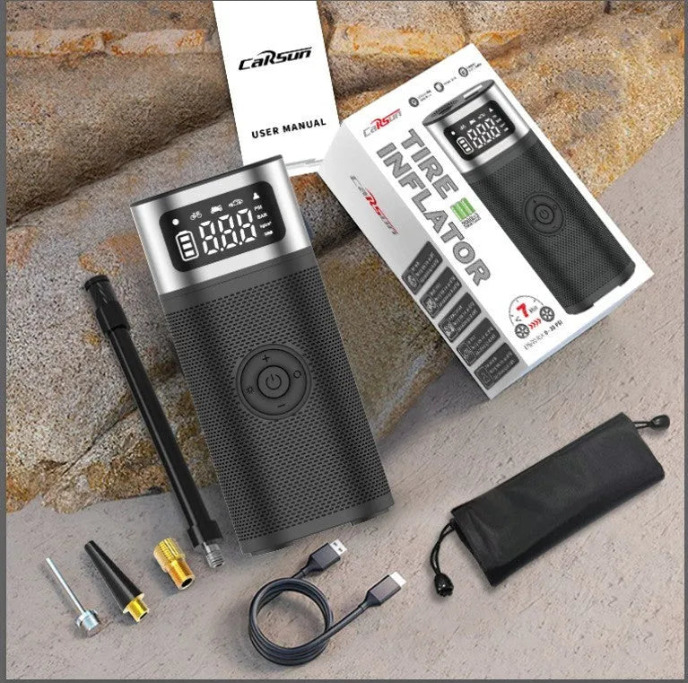 Black portable wireless vehicle air pump with 15cm tube, multiple nozzles, and USB charging cable