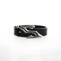 Black two-layer cowhide men's leather belt with a metal letter buckle, laid flat showing its 110cm length.