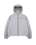 Men's grey hooded sunscreen jacket in British-style loose fit on a middle-aged man outdoors