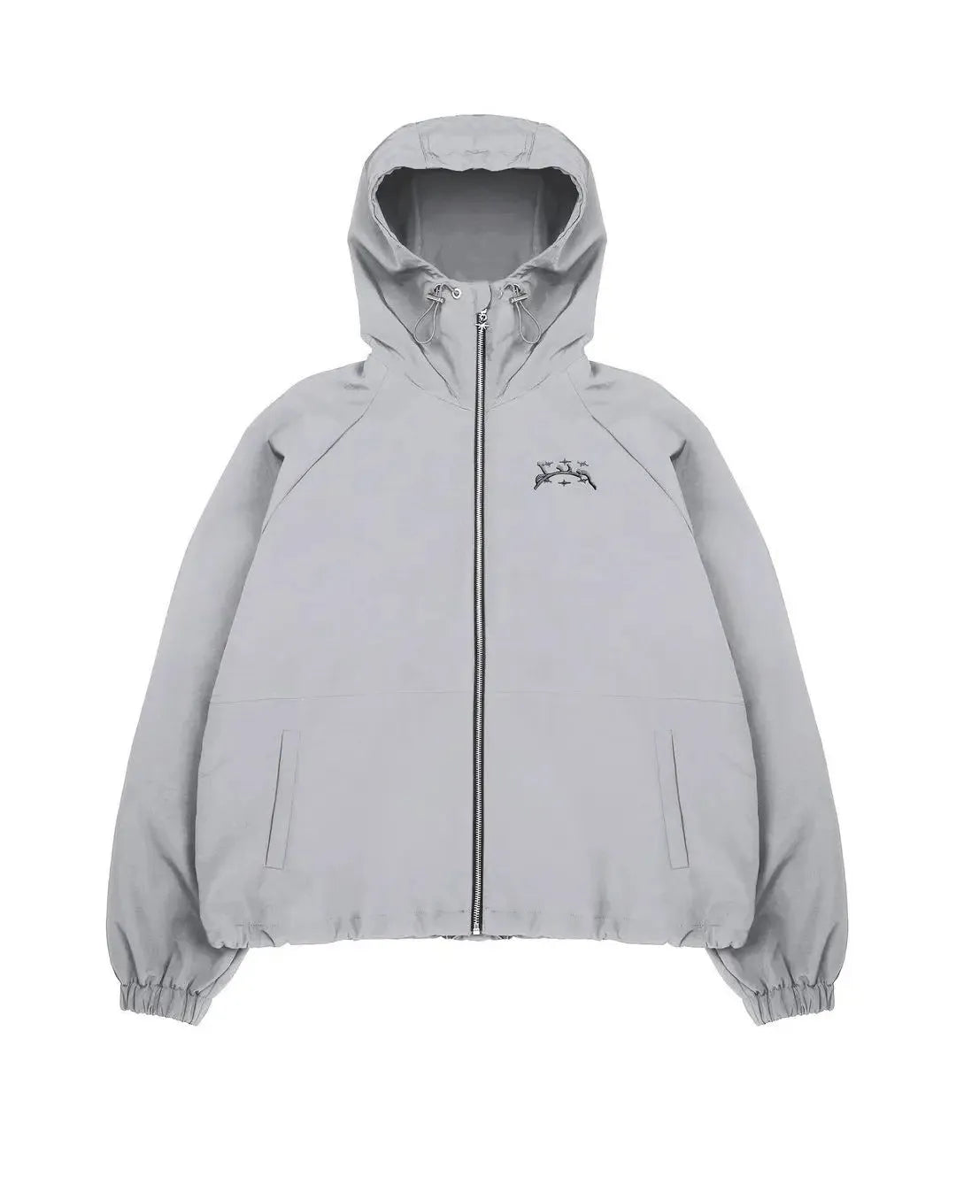 Men's grey hooded sunscreen jacket in British-style loose fit on a middle-aged man outdoors