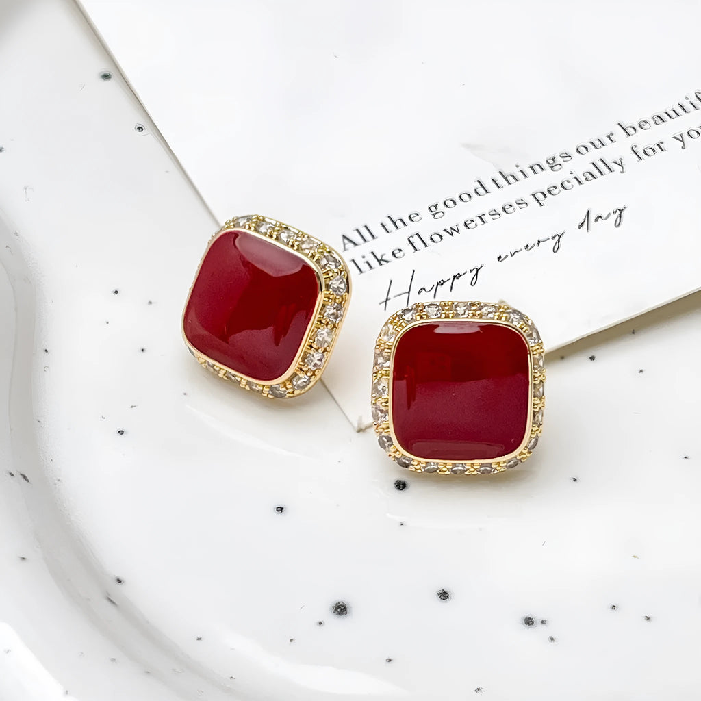 Red geometric alloy drop earrings with square detail for women.