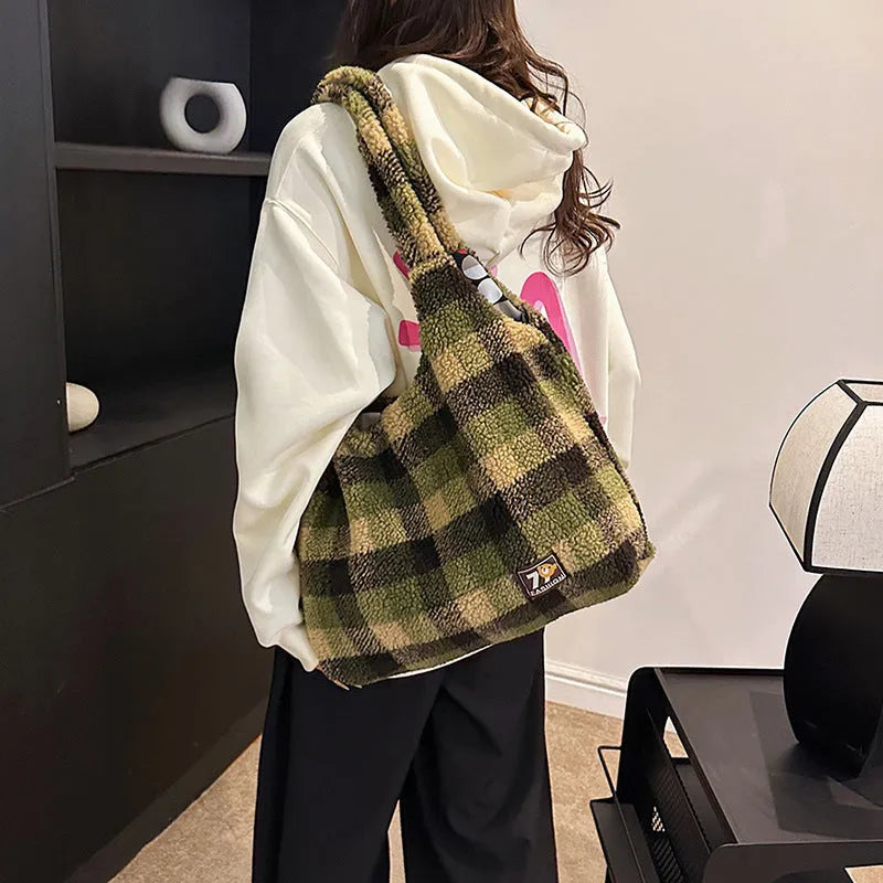 Women's plaid crossbody shoulder bag in soft plush material showing orange, purple and army green colour options