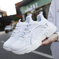 White women's casual sports shoes with mesh upper, PU sole, round toe, and ankle buckle.