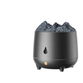 White volcanic-shaped ultrasonic humidifier and essential oil diffuser with USB cable on a wooden table.