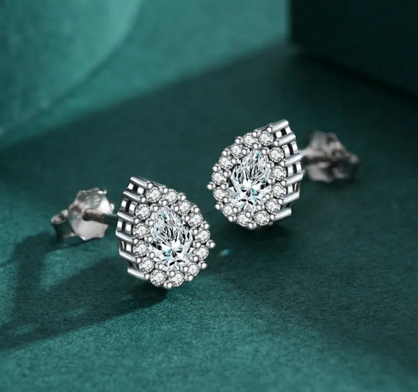 Women's silver drop ear studs with diamond cut treatment in water drop shape