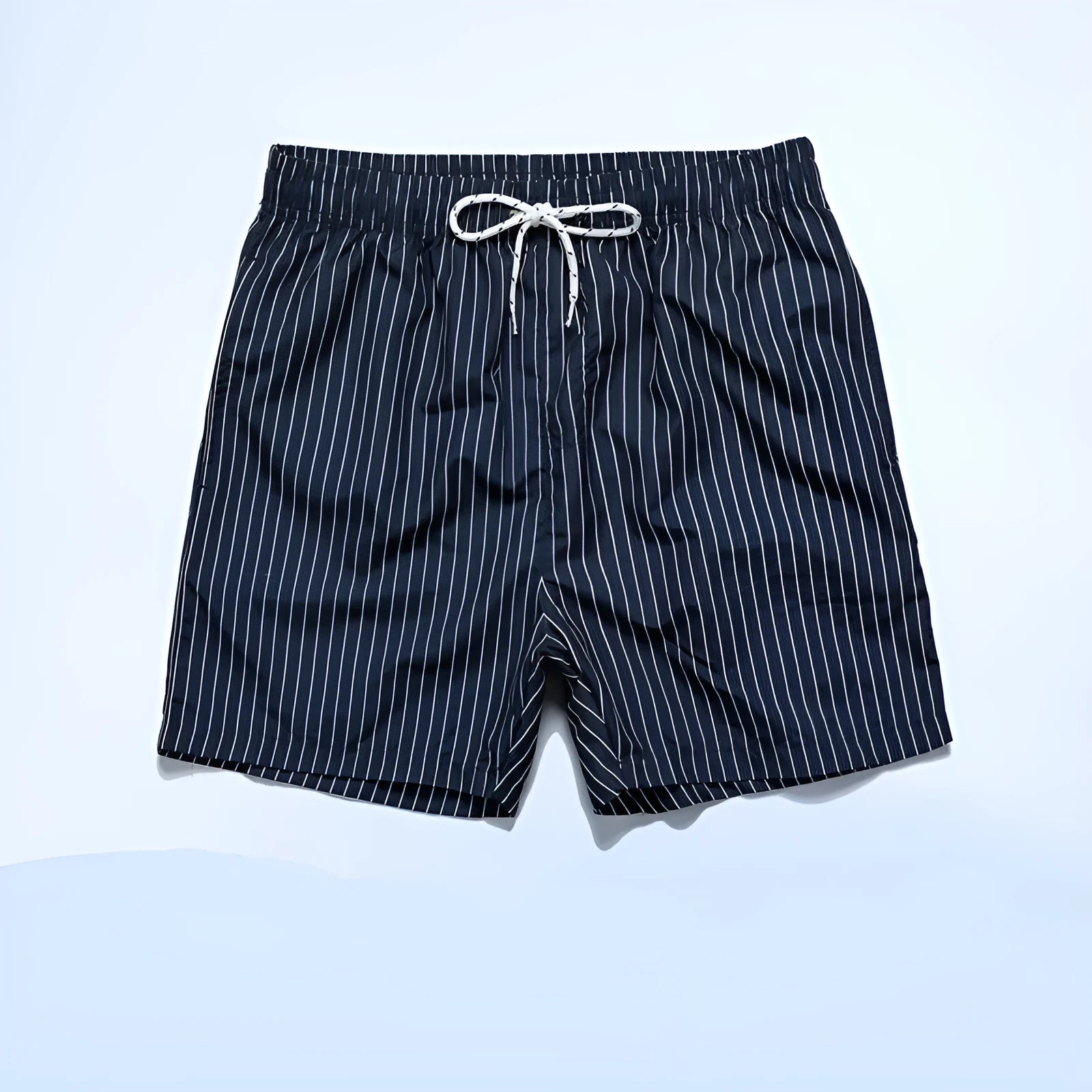 Men's striped beach shorts in navy blue, showing straight leg opening and casual fit.