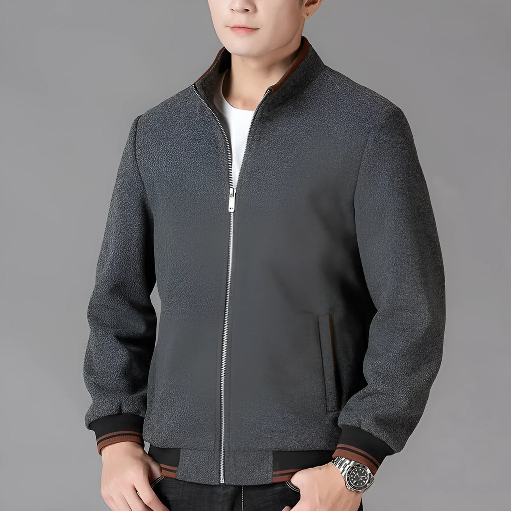 Men's grey sports-style fleece jacket with long sleeves and side pockets.