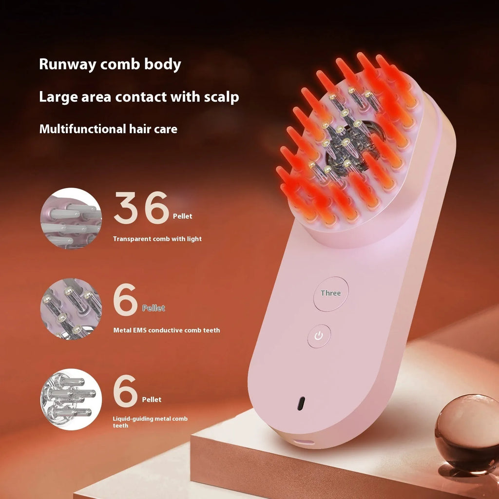 Pink and black smart massage comb with red light for scalp care, shown actual size under 10cm.