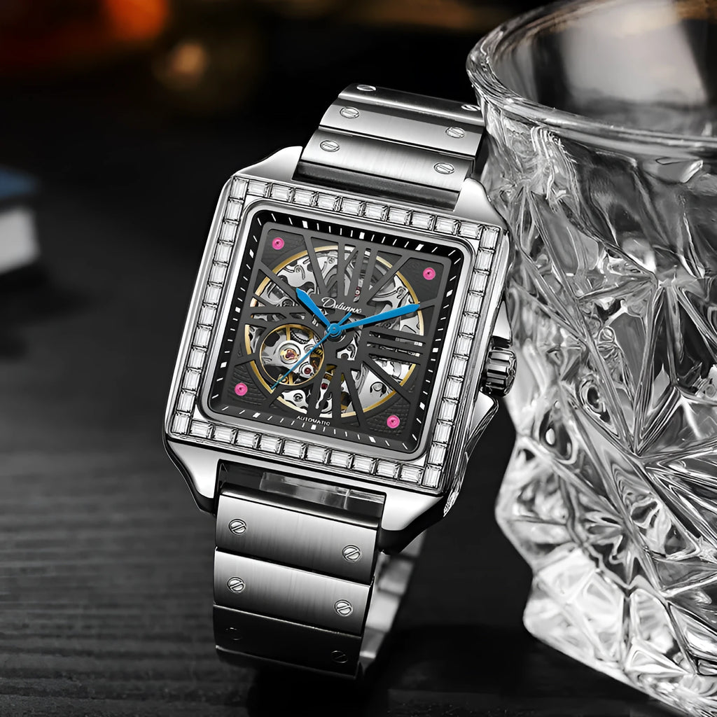 Square automatic watch for men with diamond detailing on a black leather strap.