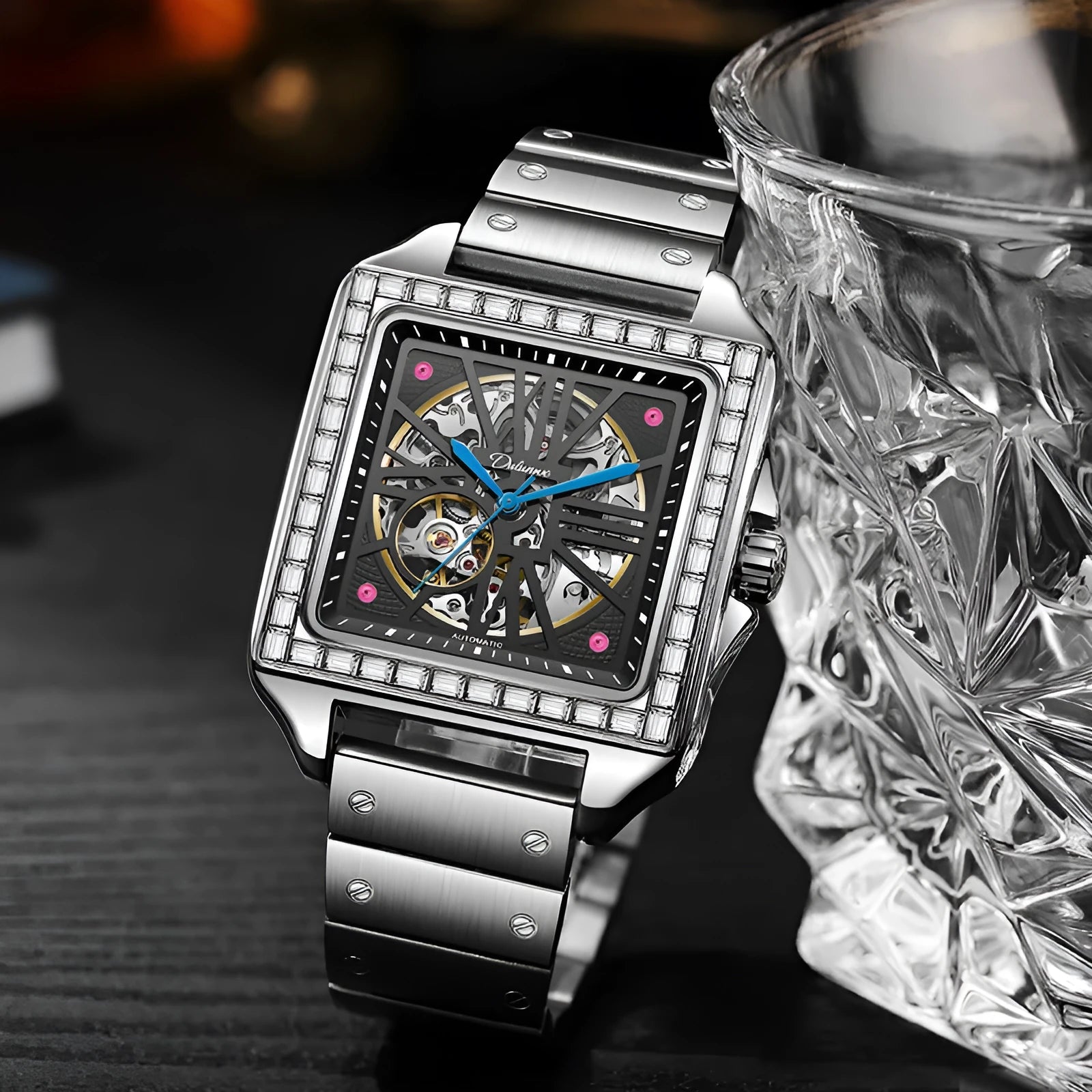 Square automatic watch for men with diamond detailing on a black leather strap.