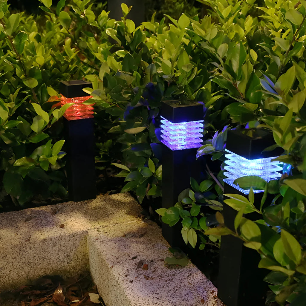Solar lawn lamp with ground spike for garden lighting, showing cuboid shape and solar panel