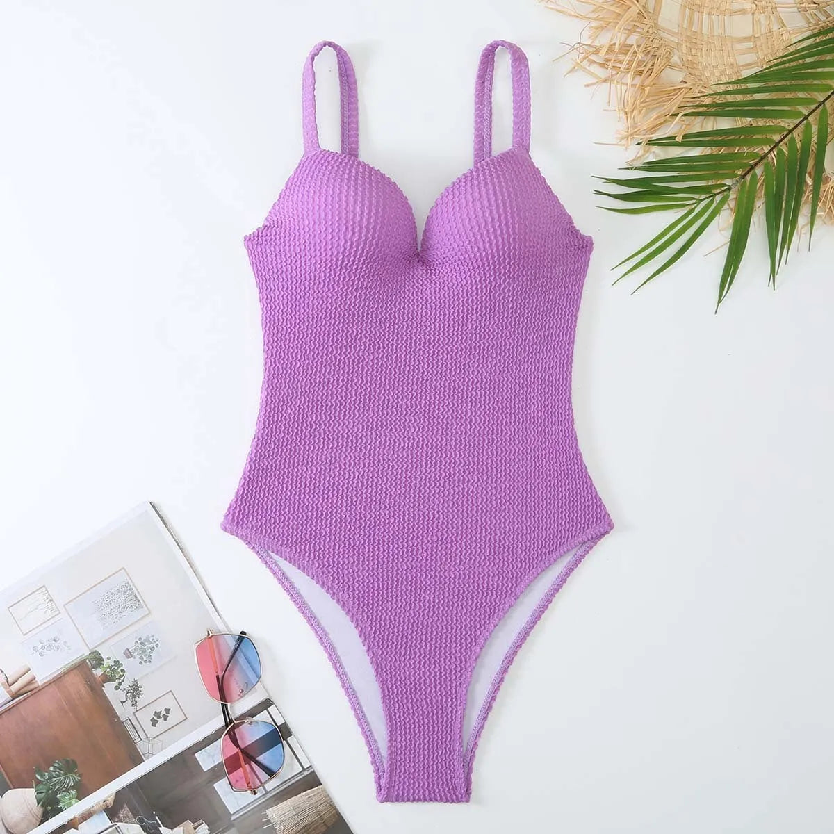 Women's sleeveless one-piece swimsuit in a sunkissed stripe pattern, shown in multiple colour options.
