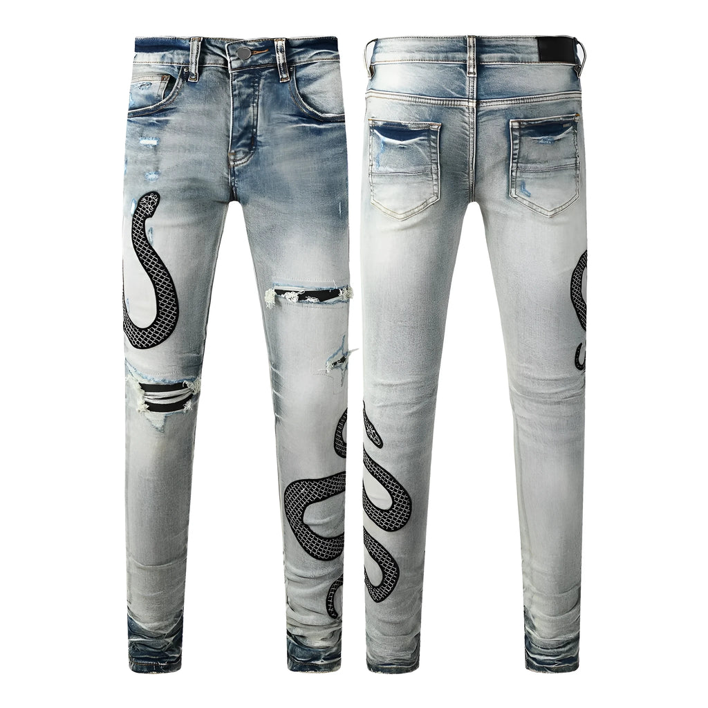Man's blue distressed skinny jeans with a street fashion wash and button fly.