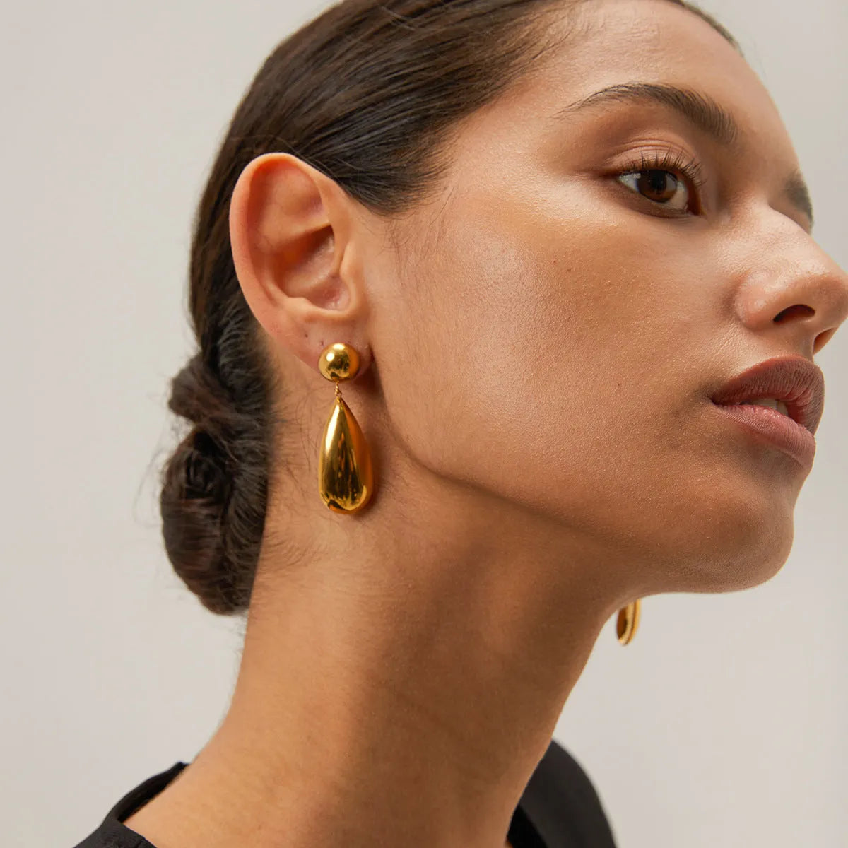 Gold hemisphere water drop pendant earrings with geometric design and electroplated finish