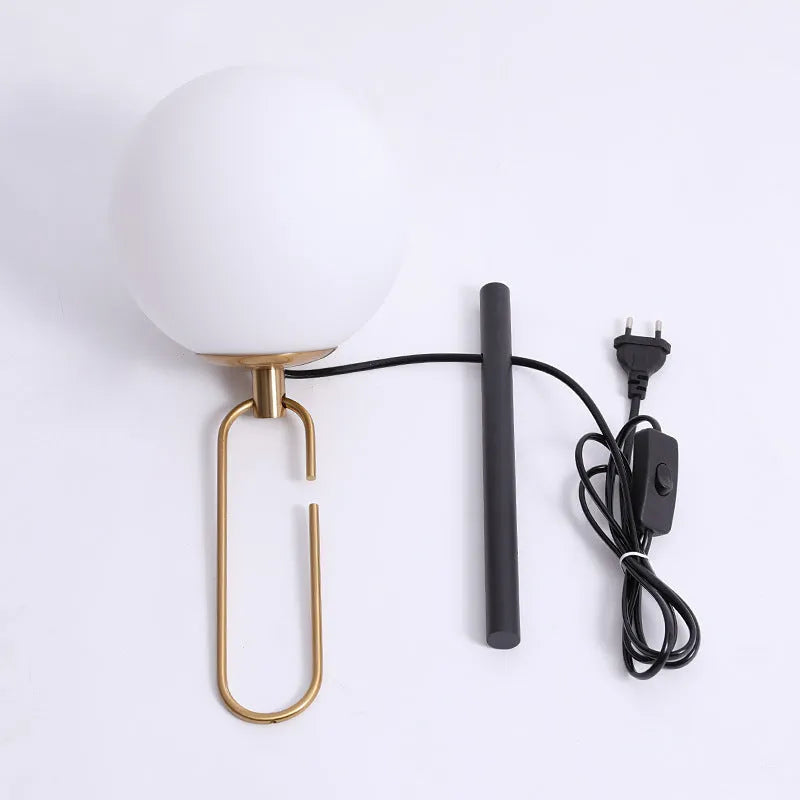 Nordic modern glass wall lamp with three light colour options on white wall
