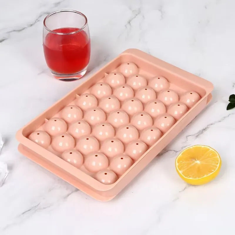 Blue silicone ice cube tray with lid showing 33 round grids, dimensions 24x14x3cm