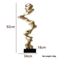 Abstract minimalist resin ornament in bright gold, silver, or blue for tabletop display