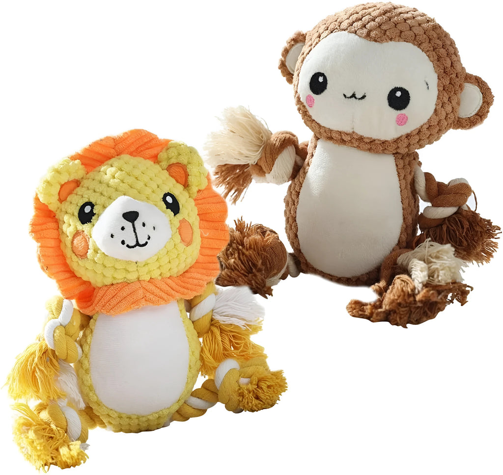 Plush lion and monkey squeaky dog toys side by side on a neutral background.