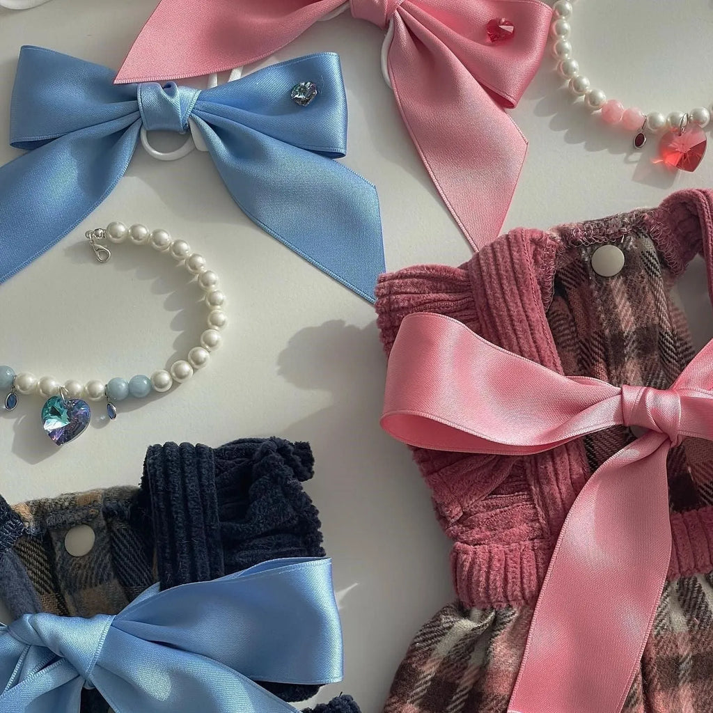 Adjustable princess style dog hair band with bow decoration in blue or pink colours