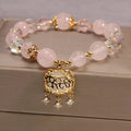 Yellow agate crystal and gold silk women's bracelet in khaki colour.