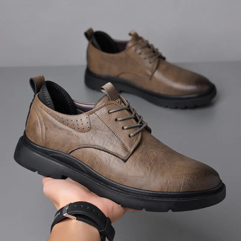 Men's black and brown breathable leather business shoes with rubber sole and sewing line detailing