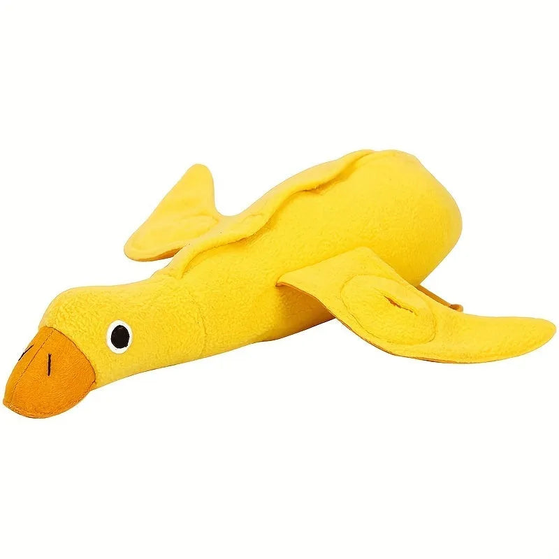 Yellow plush duck dog training toy with squeaker and treat dispensing features