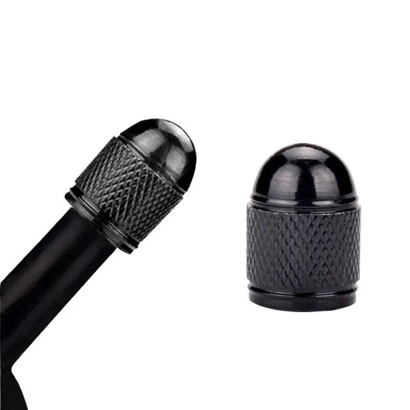 Aluminium alloy mountain bike tyre valve cap in gold, silver, red, blue, and black colours.