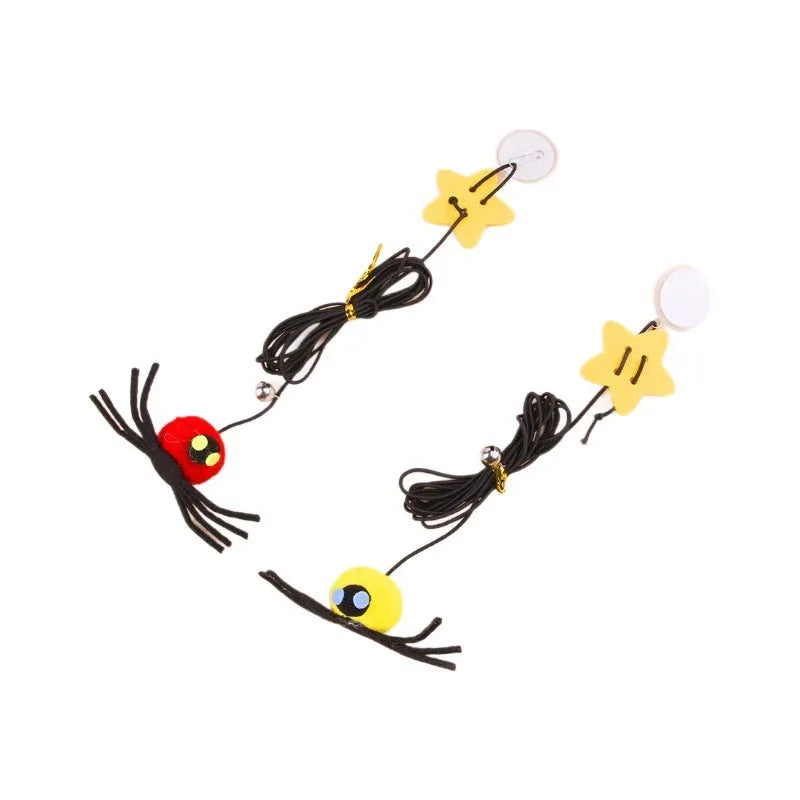 Hanging cat toy with feathers, bell and colourful spiders on elastic rope