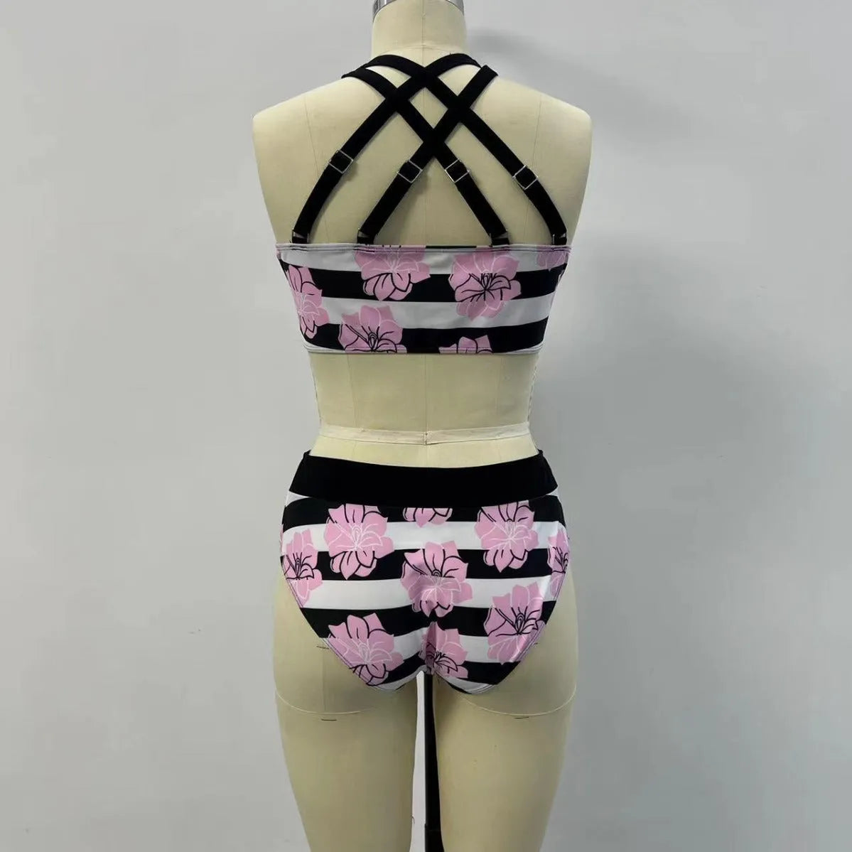 Black women's split bikini with belly coverage design for swimming